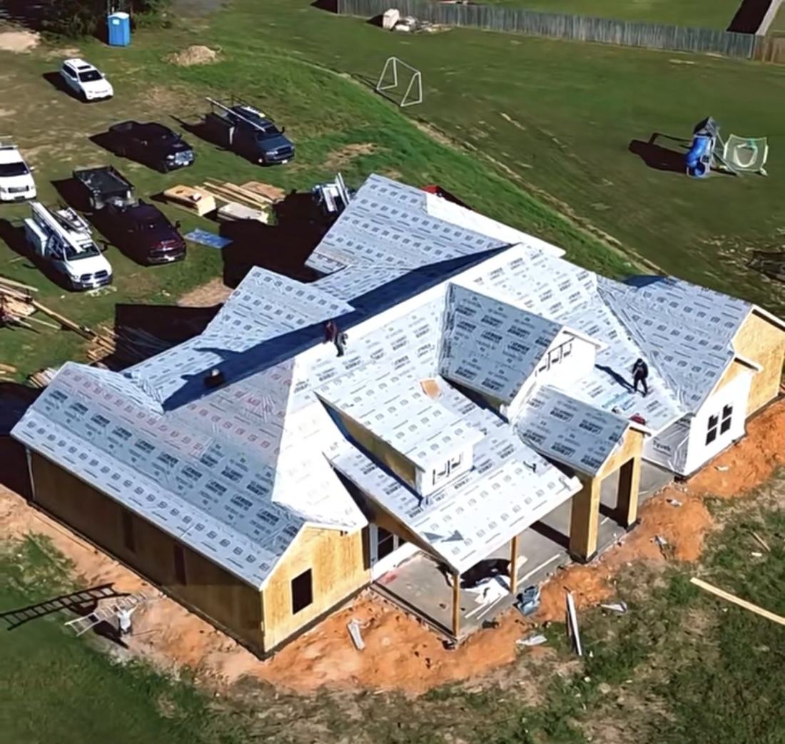 New home roof dried in with underlayment by RC21 LLC in Northeast Texas